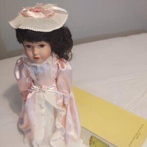 Porcelain Doll by Rose